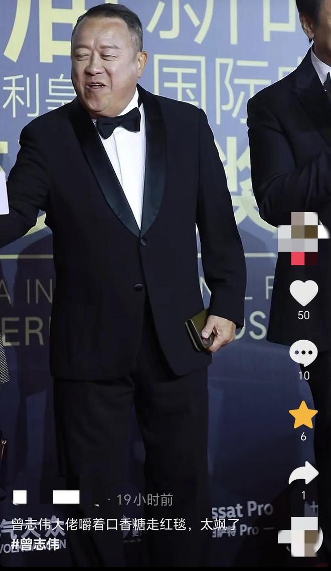 台上嚼口香糖与金沙总裁骑旋转木马挺幼稚米乐m6登录入口曾志伟澳门参加电影节(图8)